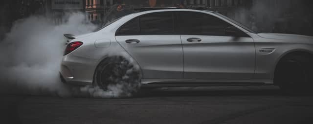 Why Does My Car Smell Like Burning Rubber: Causes and Solutions